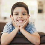 Happy young boy smiling at dental office in Spring, Texas.