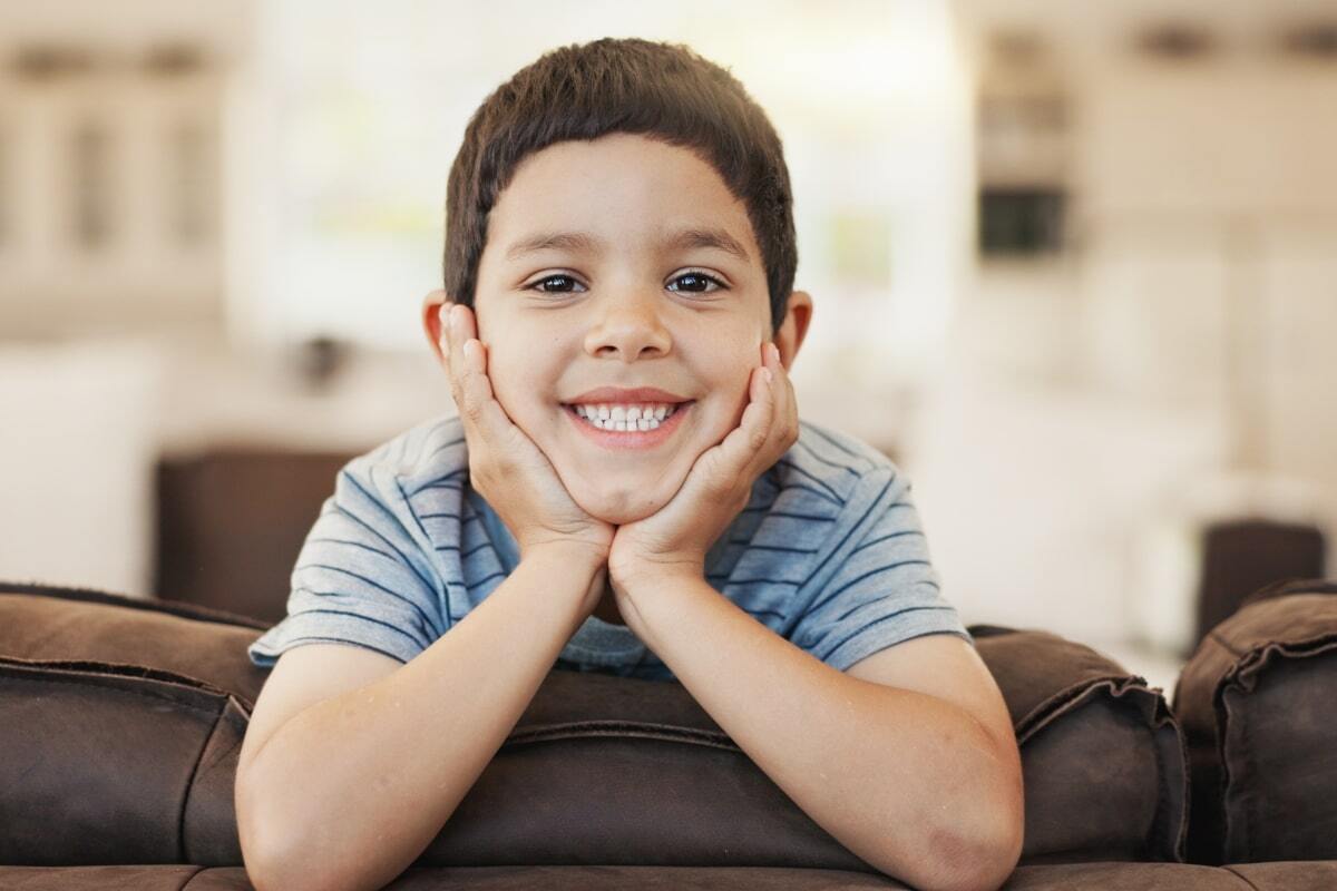 Happy young boy smiling at dental office in Spring, Texas.